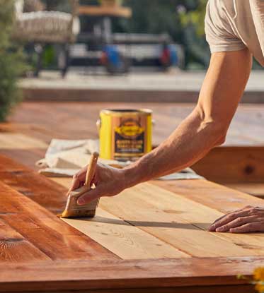 staining a deck outside