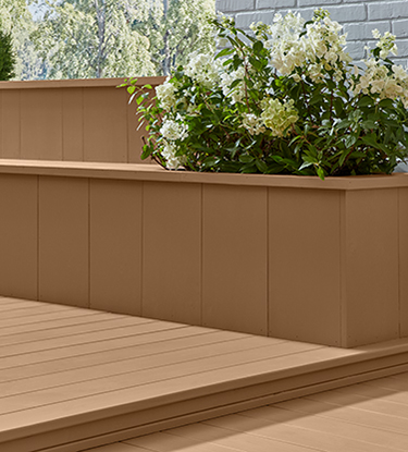 stained bench with flowers