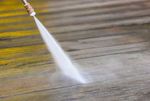 Power washing a deck